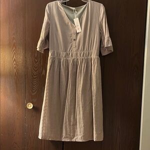 Petal Lush short sleeved, midi dress. Greenish beige. Size Large NWT